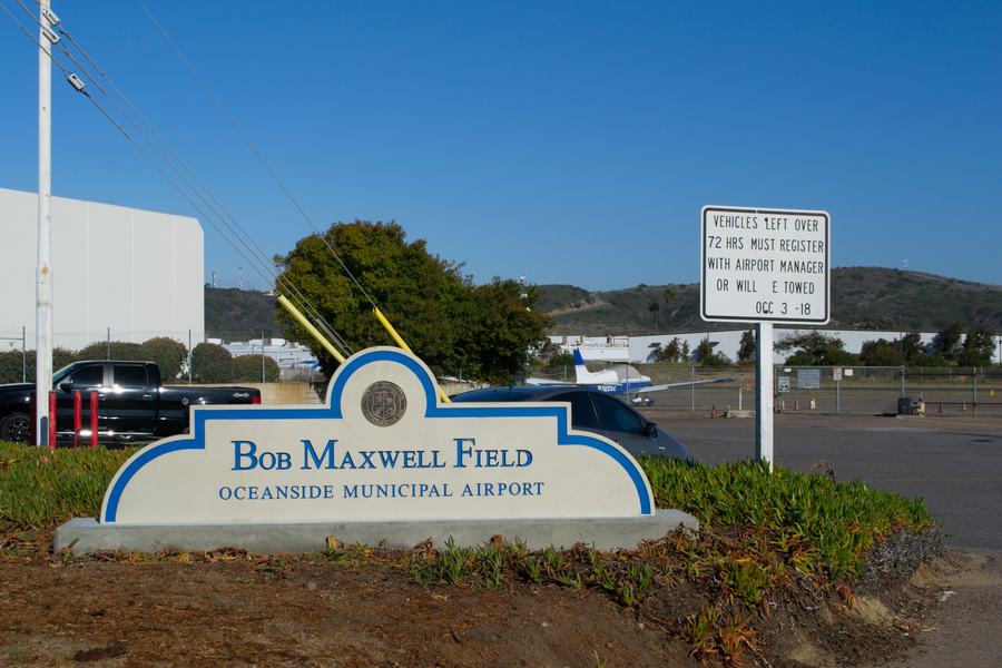 Entrance sign reading Bob Maxwell Field, Oceanside Municipal Airport