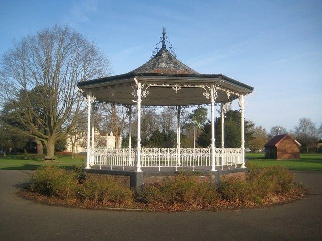 The restored bandstand in Barra Hall Park, painted white, with new planting round its base