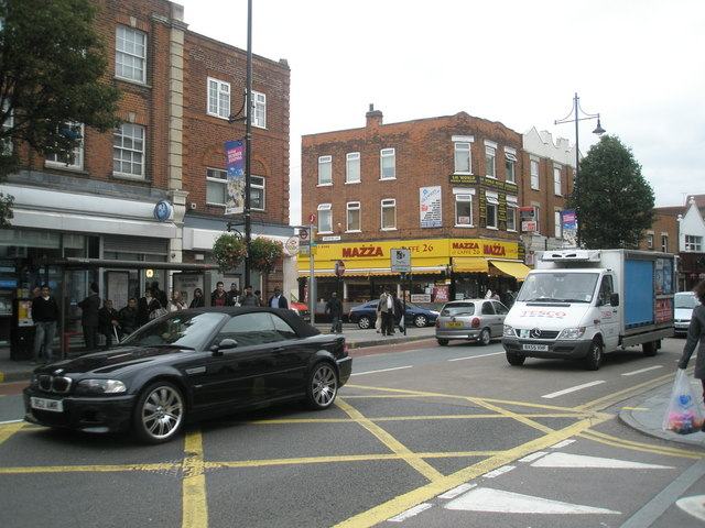 Traffic and pedestrians on Southall Broadway on a weekday