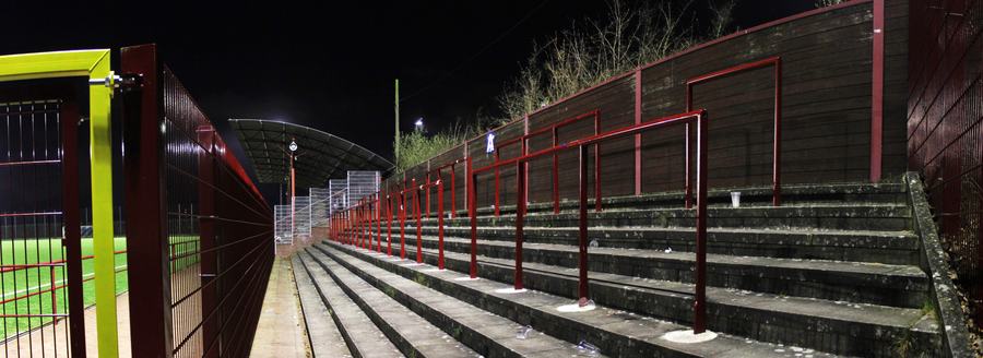 Panorama of the pitch and covered stand at the Wolfgang-Meyer-Sportanlage in Hamburg-Stellingen during a match