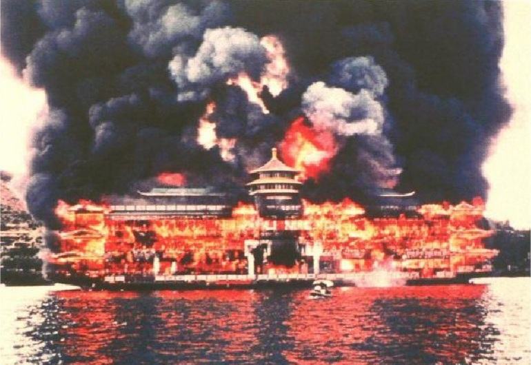 The Jumbo Floating Restaurant on fire in Aberdeen, Hong Kong, 30 October 1971, while still under construction.