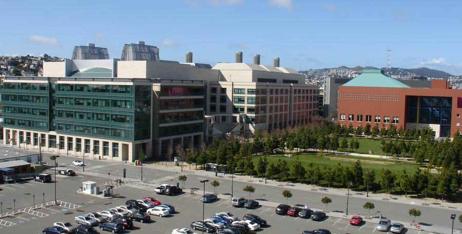 The UCSF Mission Bay campus seen from the Third Street garage; Genentech Hall, renamed Mendel Hall for the film, is the second building from the left.