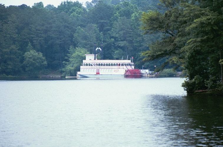 White paddle-wheel riverboat under way on Stone Mountain Lake in 2005