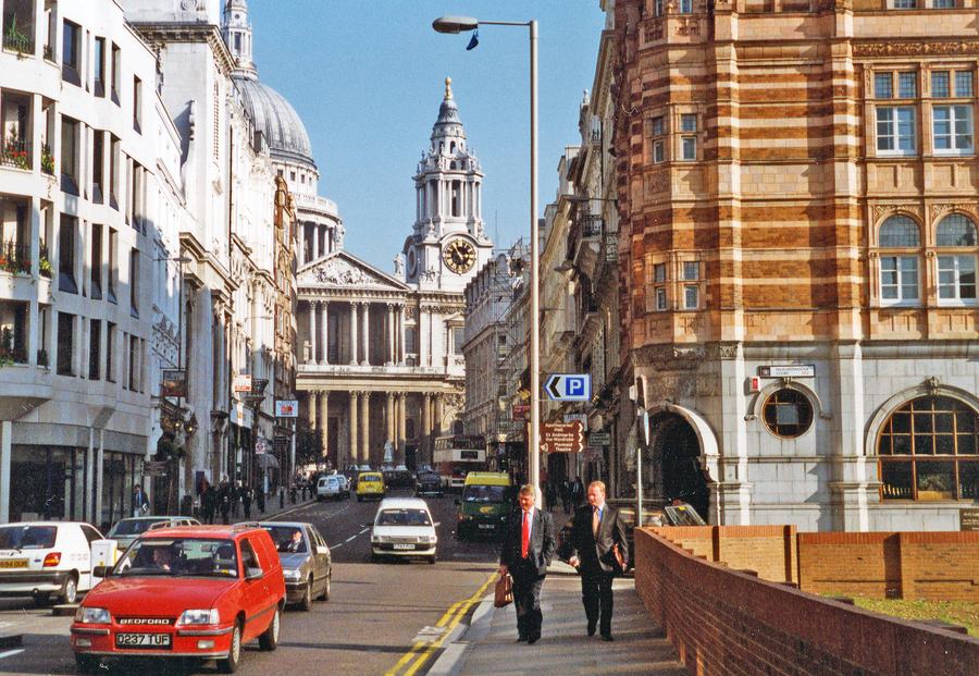 Ludgate Hill in 1994 looking west to the west front of St Paul's Cathedral, with 1990s cars and two men in suits on the pavement.