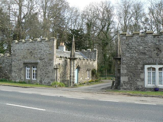 Two castellated stone lodges flanking the entrance drive to Megginch Castle