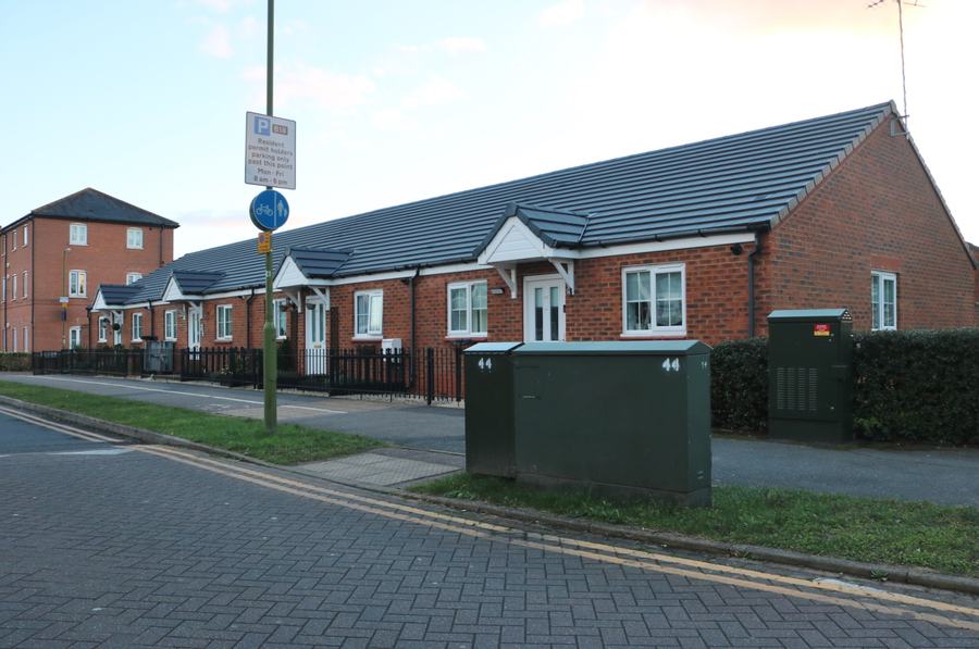 A row of brick bungalows on a residential street in Hatfield named The Runway