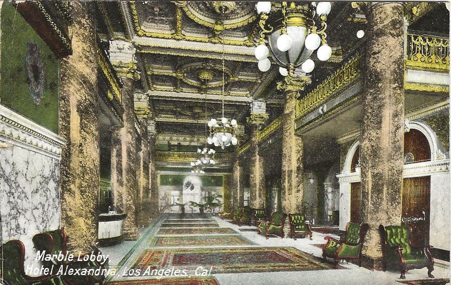 Colour postcard of a hotel lobby with marble columns, chandeliers and a coffered gold ceiling