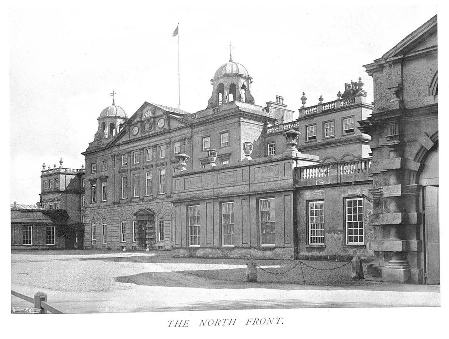 Black-and-white early-20th-century photograph of the north front of Badminton House with corner cupolas, captioned 'The North Front'