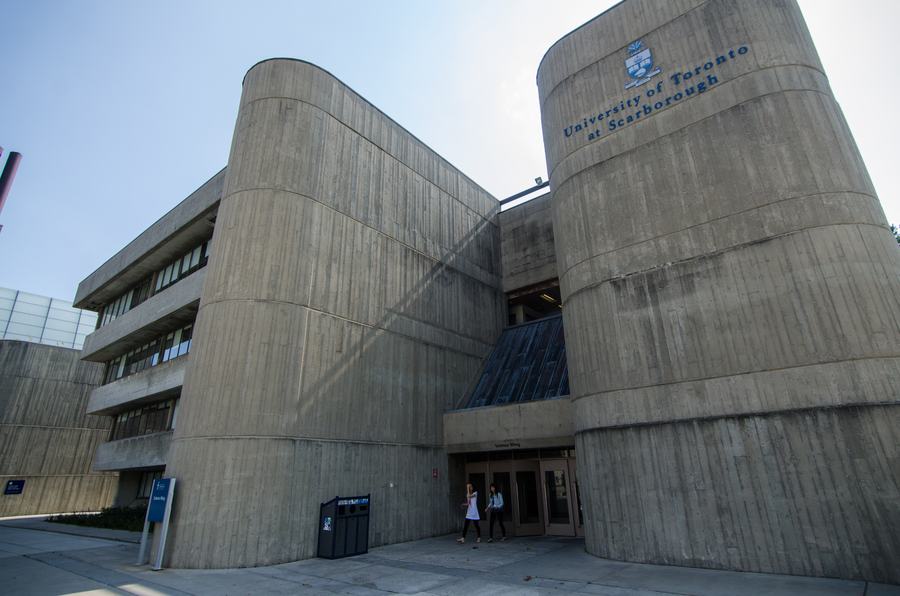 Board-formed concrete towers of the Science Wing, University of Toronto Scarborough, with the university crest high on the wall